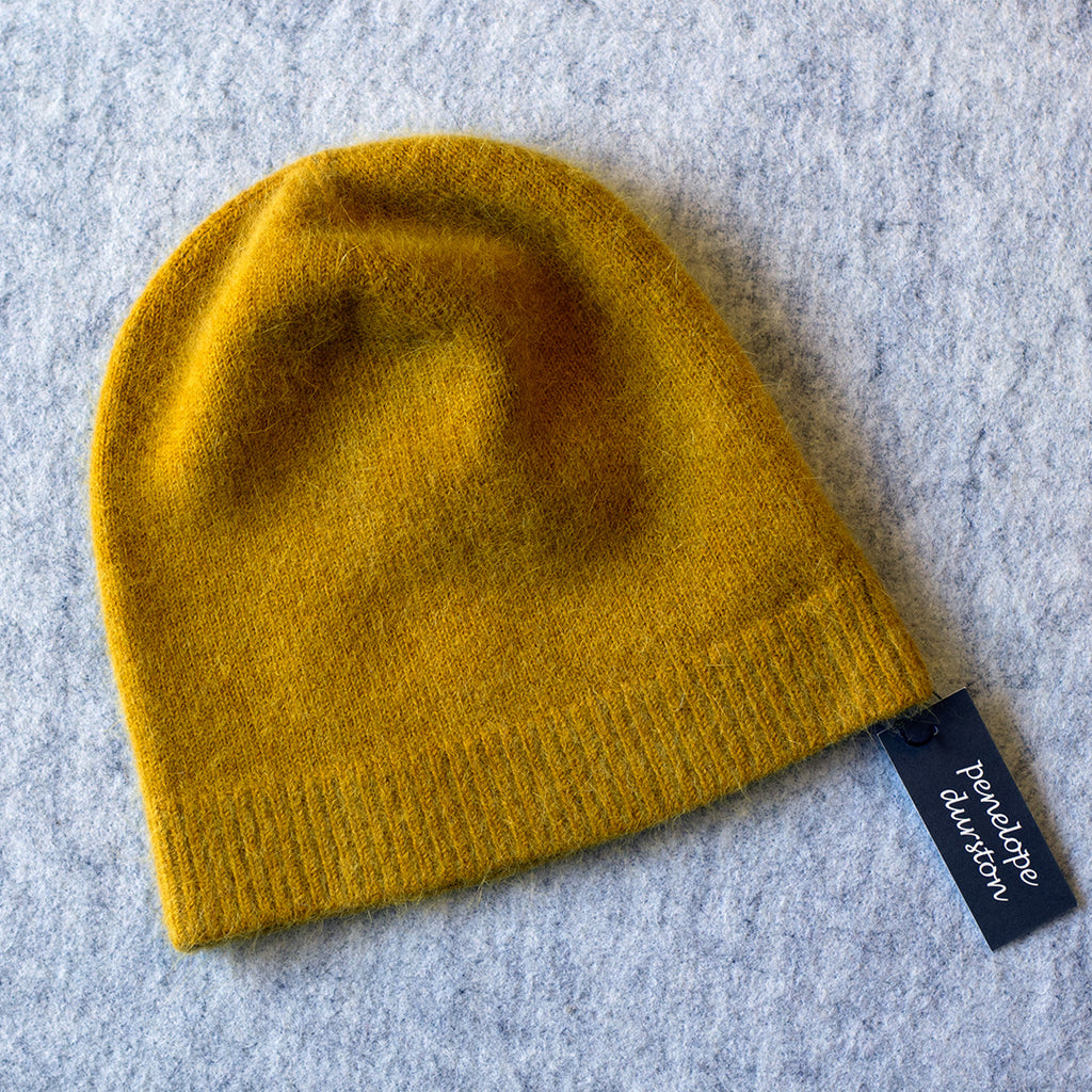 Mustard coloured beanie made from angora and lambswool