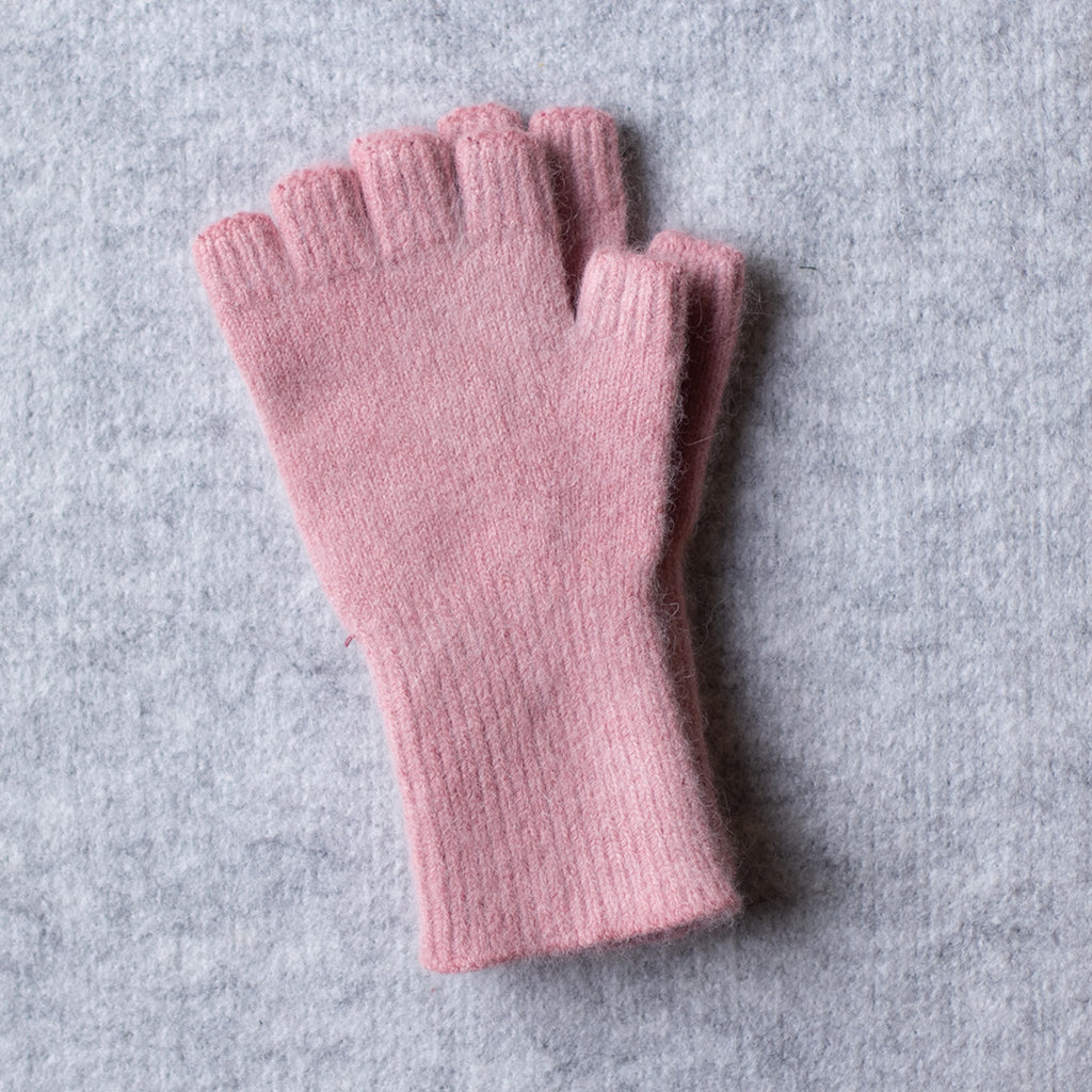 Picture of medium length fingerless gloves made from angorra and lambswool in a pink colourway