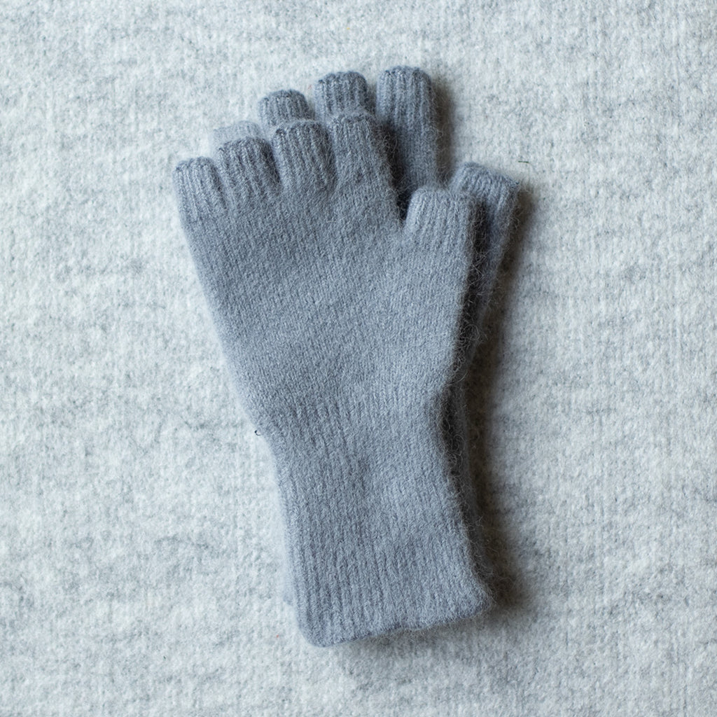 Picture of medium length fingerless gloves made from angorra and lambswool in a soft grey colourway