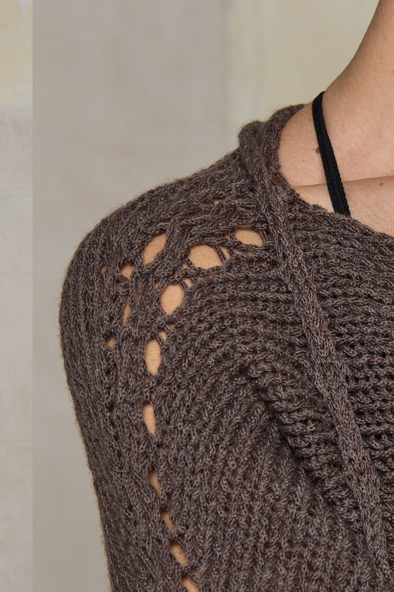 Close up fabric view of loose cord knit batwing in mushroom, designed by Wendy Voon knits and made in Melbourne.
