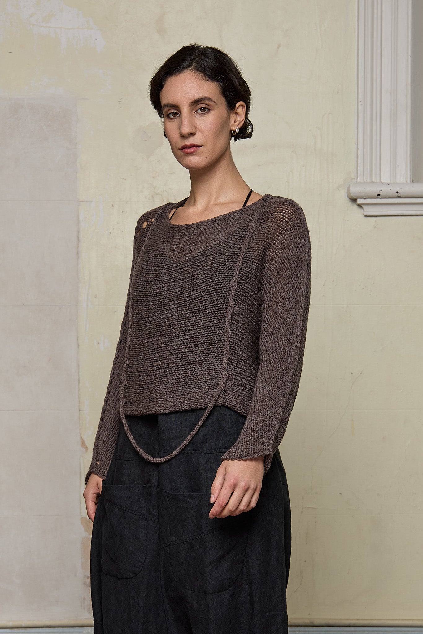 Front view of loose cord knit batwing in mushroom, designed by Wendy Voon knits and made in Melbourne.