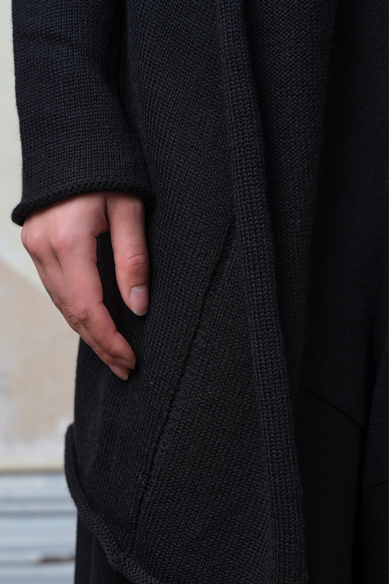 Close up fabric view of merino cross over in black