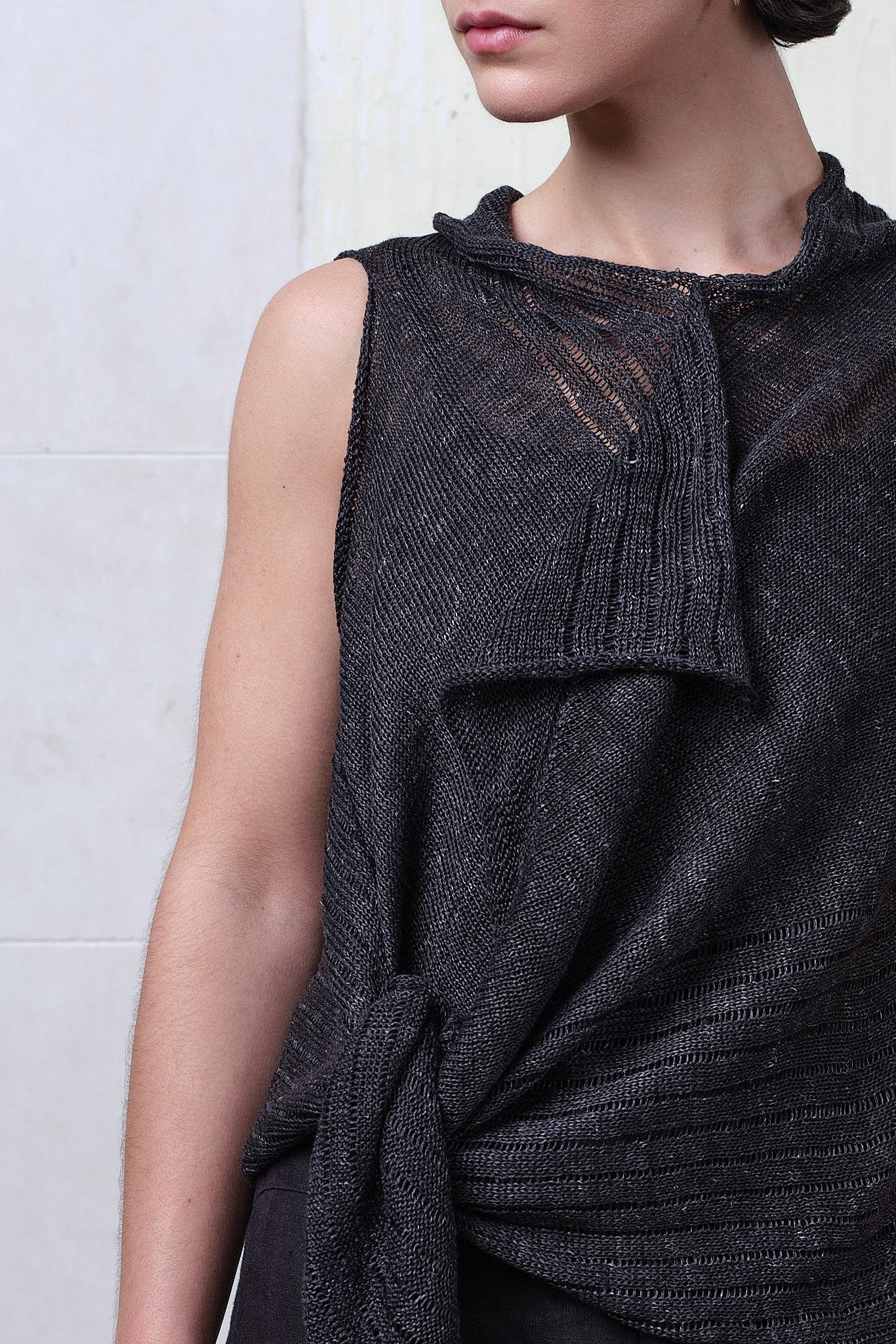 Close fabric view of charcoal linen laddered vest. Designed and knitted in Melbourne by Wendy Voon knits.