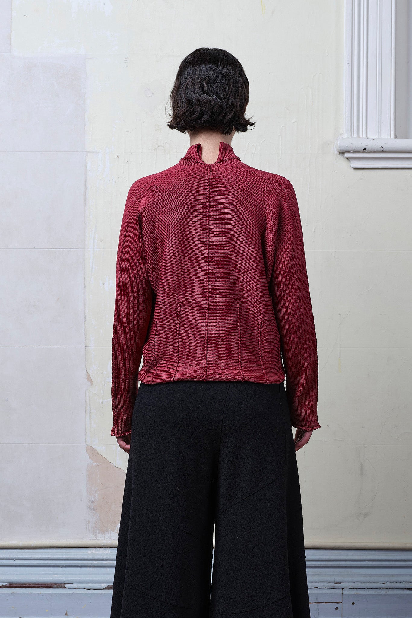 Model wears cotton welted cardi in damask rose colourway.