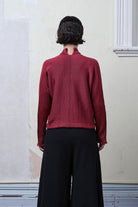 Model wears cotton welted cardi in damask rose colourway.