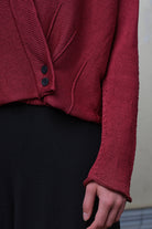 Detail of cotton welted cardi in damask rose colourway