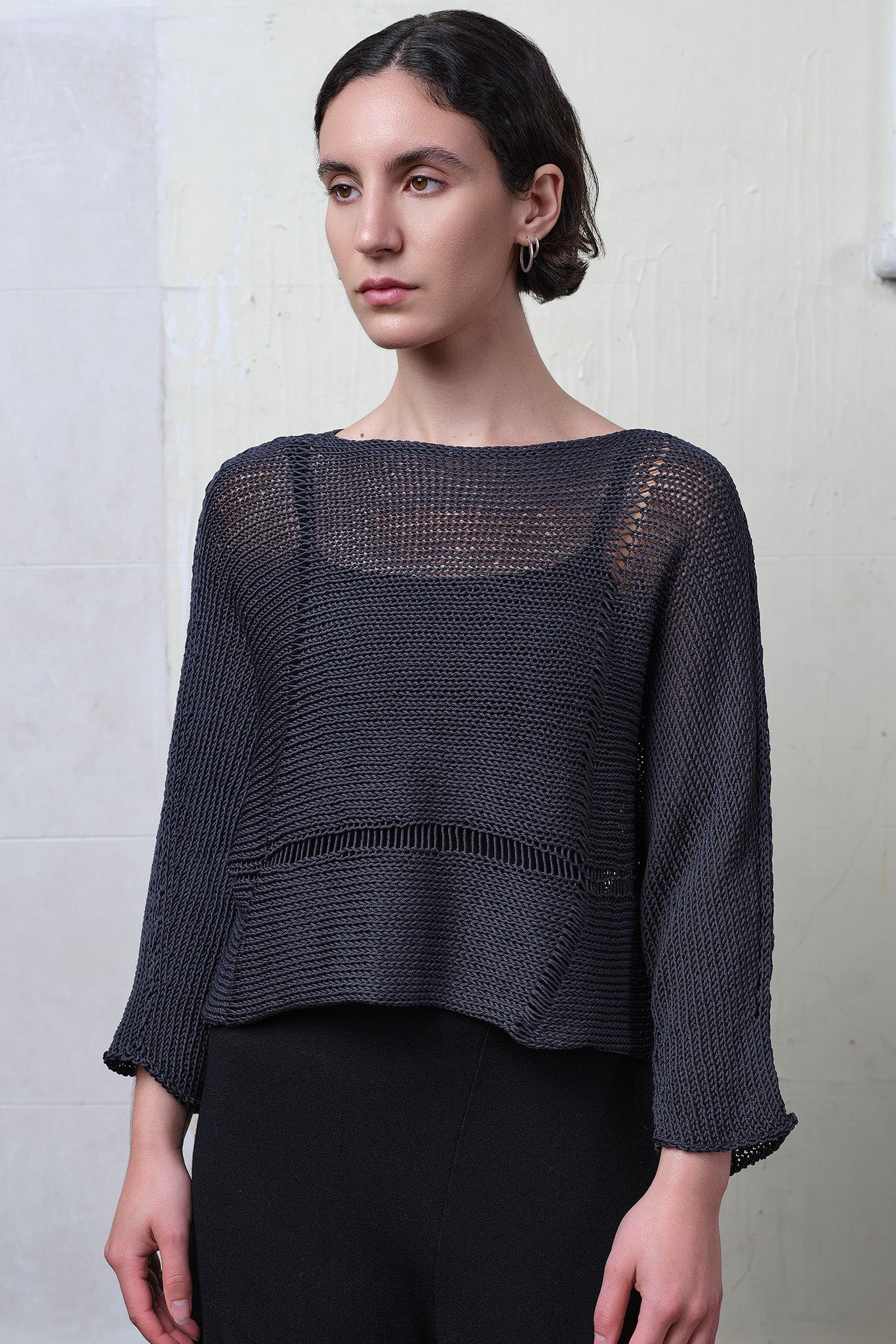 Front view of Cotton Batwing  in slate colourway, featuring large stitch details,  designed by Wendy Voon knits.