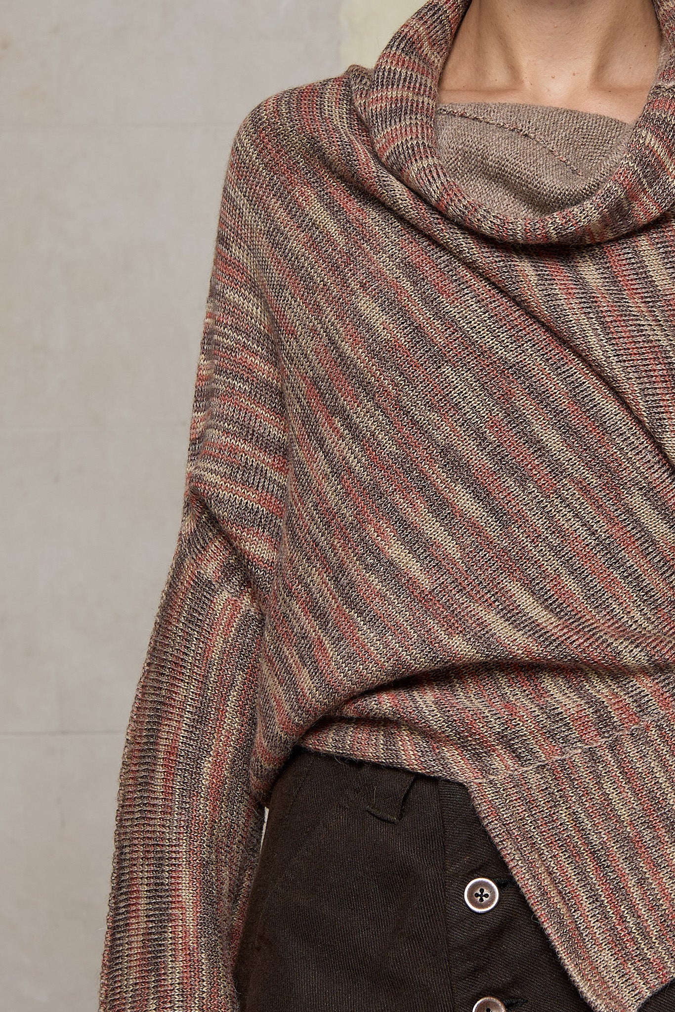 Close up fabric view of a alpaca/wool/cotton variegated  bias cut jumper in an autumn melange colourway, a designed by Wendy Voon and made in Melbourne.