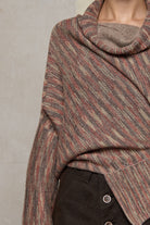 Close up fabric view of a alpaca/wool/cotton variegated  bias cut jumper in an autumn melange colourway, a designed by Wendy Voon and made in Melbourne.