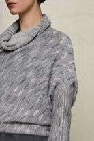 Close up fabric view of a alpaca/wool/cotton variegated  bias cut jumper in a winter melange colourway, a designed by Wendy Voon and made in Melbourne.