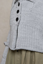 Close up fabric view of off white superfine merino wool ruched cardi,  designed and made by Wendy Voon knits.