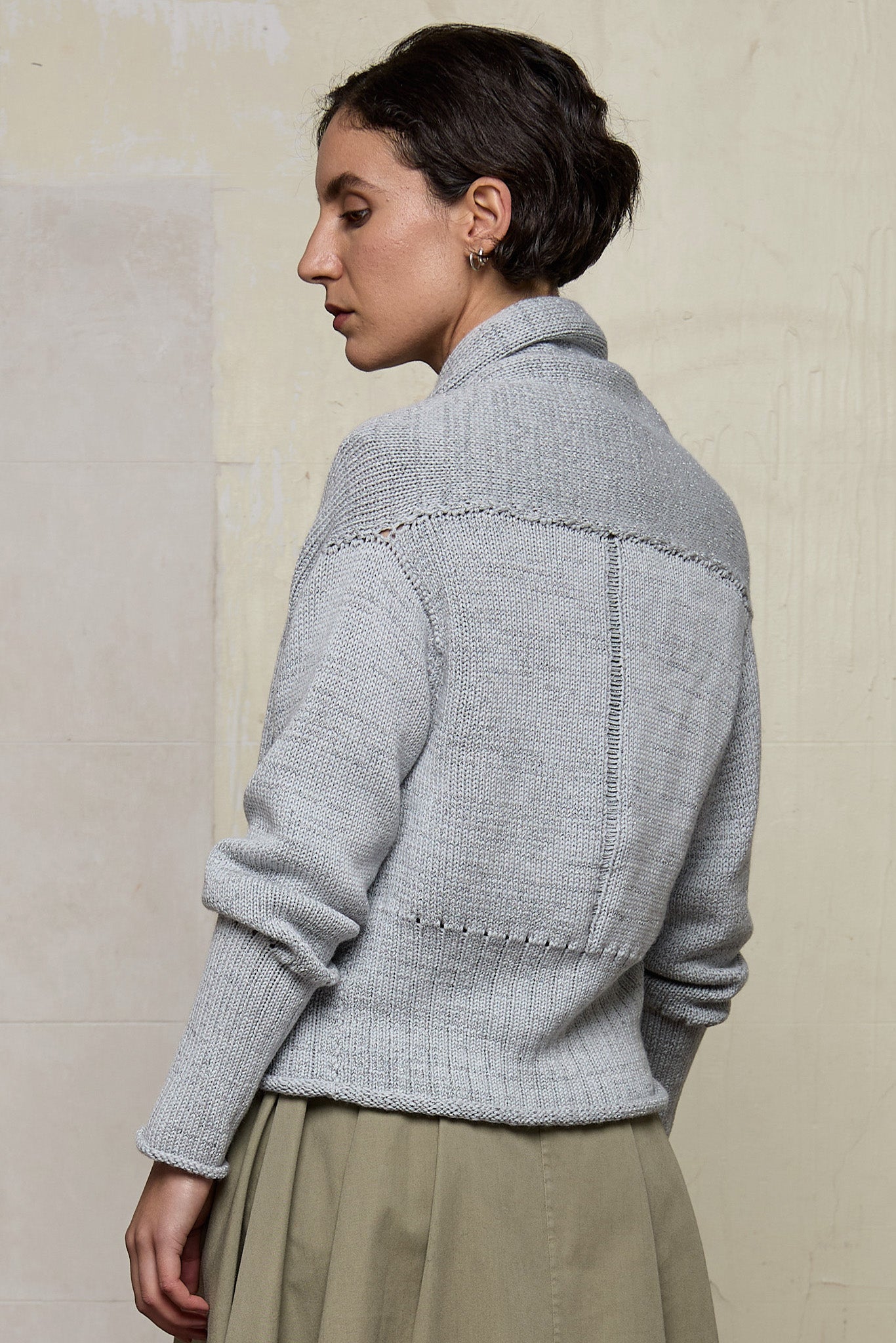 Back view of off white superfine merino wool ruched cardi,  designed and made by Wendy Voon knits.