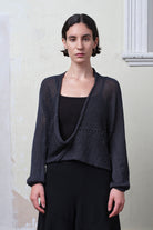 Model wears cotton cropped jumper upside down in slate. Designed and knitted in Melbourne by Wendy Voon knits