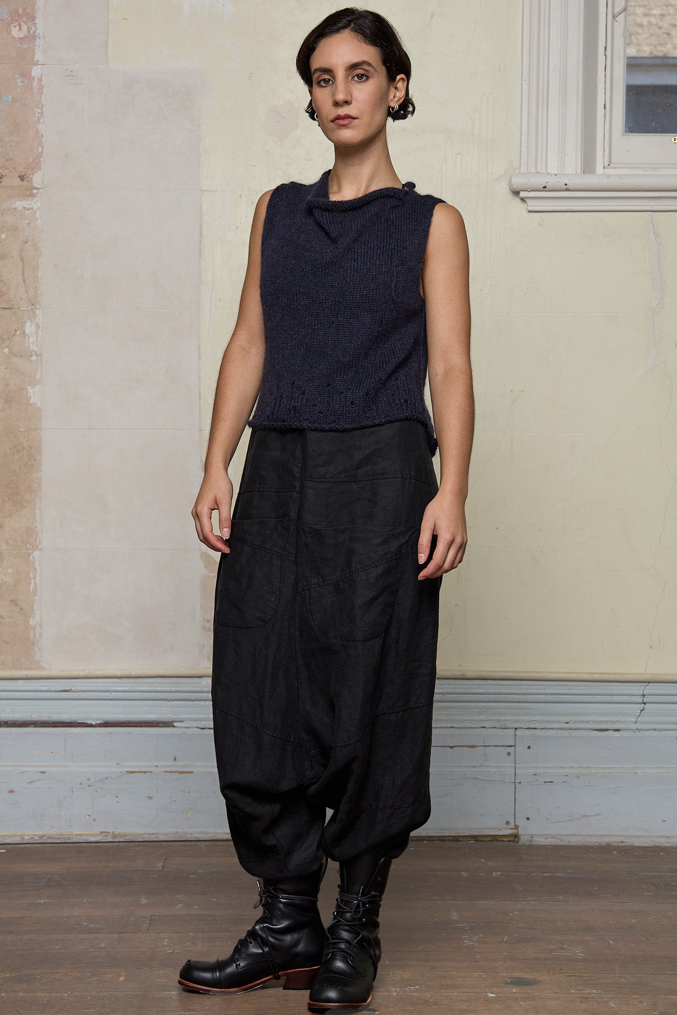 Front view of model wearing super lush knitted vest in midnight colourway, designed and knitted in Melbourne by Wendy Voon knits