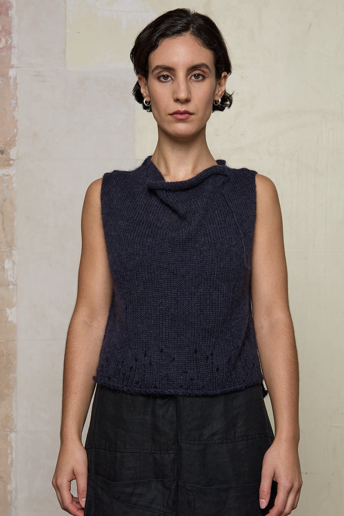 Front view of model wearing super lush knitted vest in midnight colourway, designed and knitted in Melbourne by Wendy Voon knits