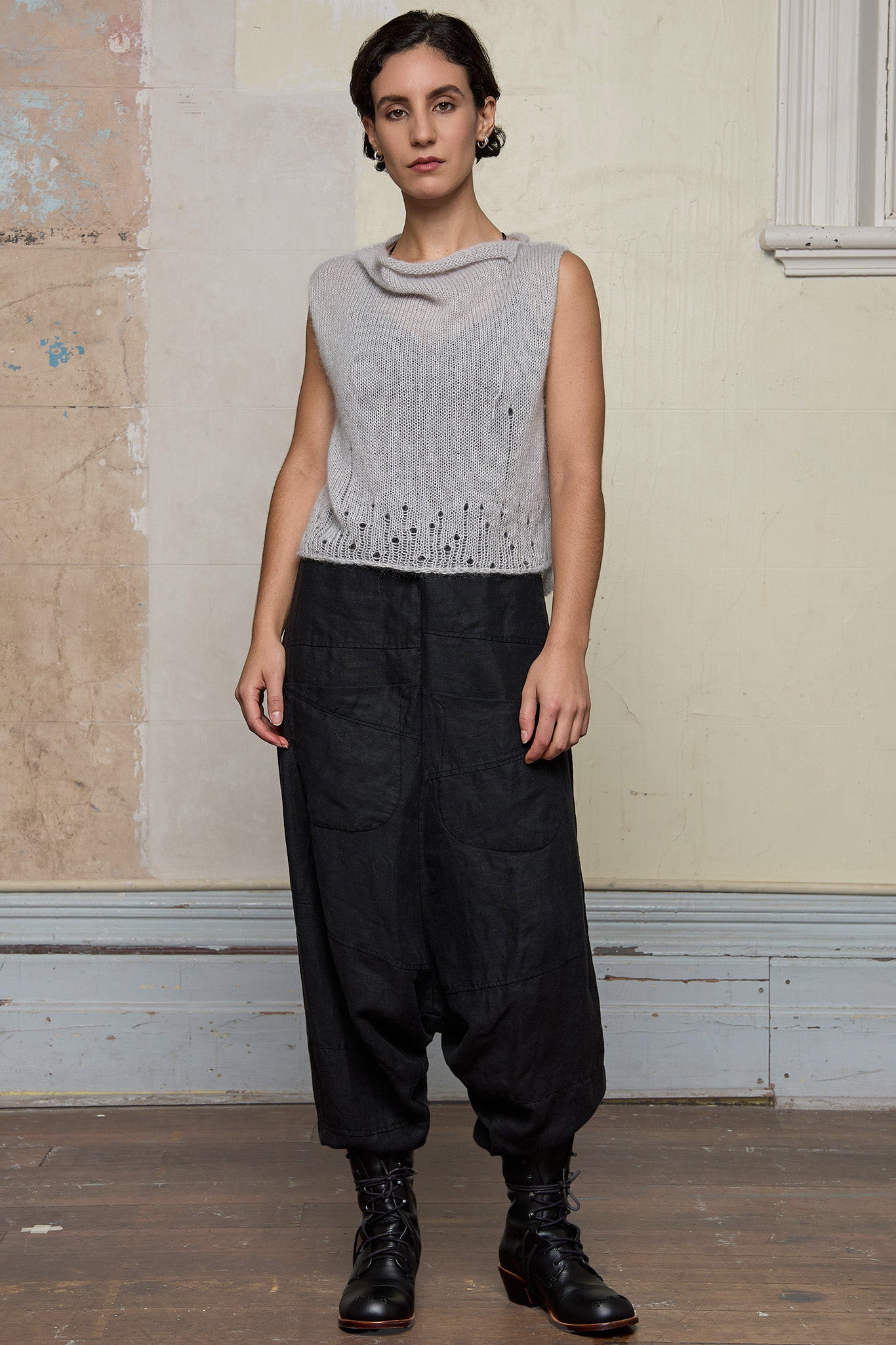 Front view of model wearing super lush knitted vest in soft grey colourway, designed and knitted in Melbourne by Wendy Voon knits