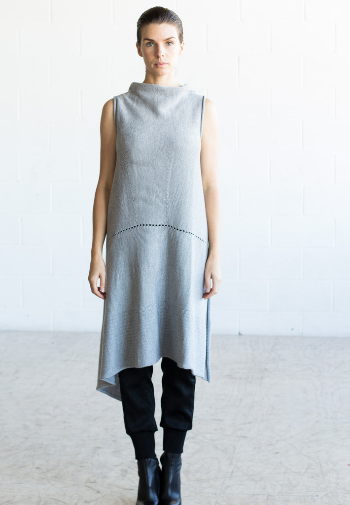Front view of Asymmetric Longline vest design in silver grey melange merino, worn back to front with seam and stitch detail