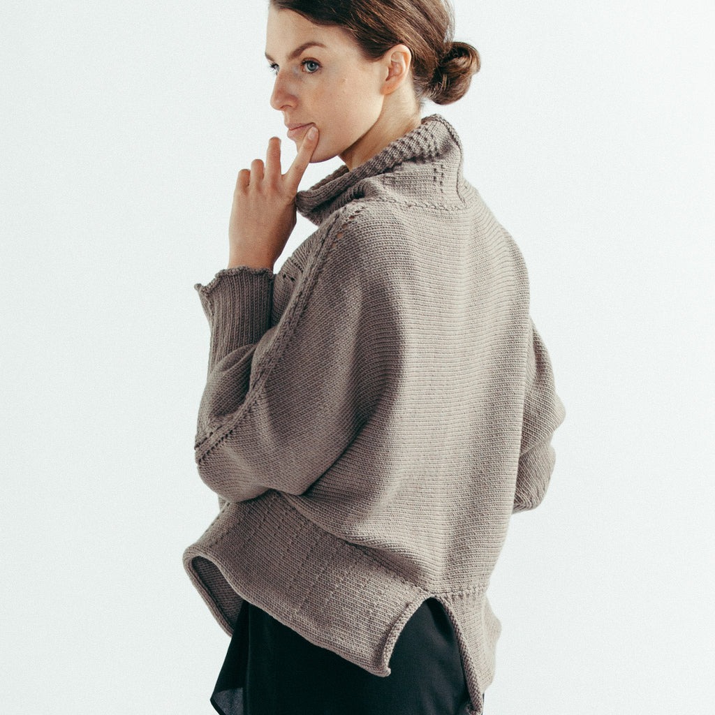 Back view of the Chunky Funnel Knit Batwing jumper in taupe merino wool