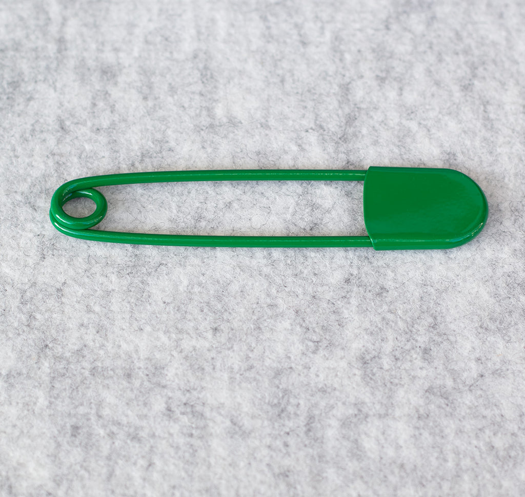 Giant safety pin in green