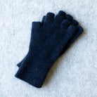Deep blue coloured fingerless gloves in a merino wool, possum and silk blend