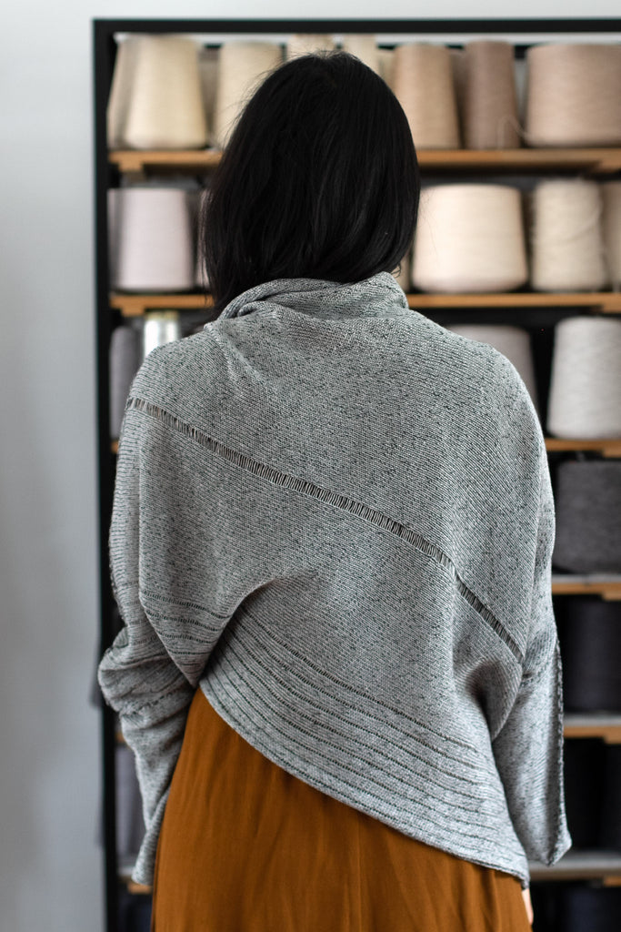 Back view of linen bias jumper in silver grey colourway backed with black, designed and knitted in Melbourne by Wendy Voon knits