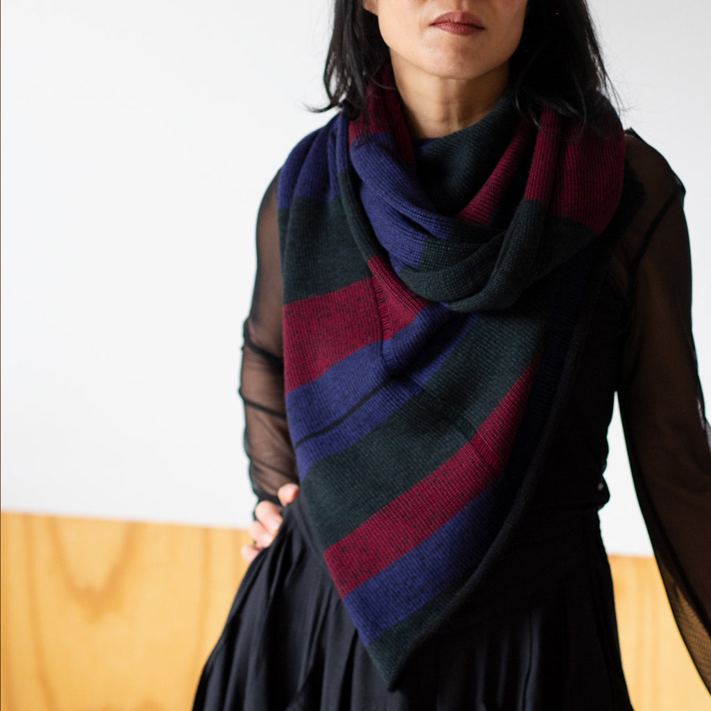 Model wears a multi-coloured infinity scarf, designed by Wendy Voon and made in Melbourne