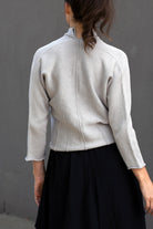 Back view of welted cotton cardi in pearl colourway, designed and made in Melbourne by Wendy Voon Knits