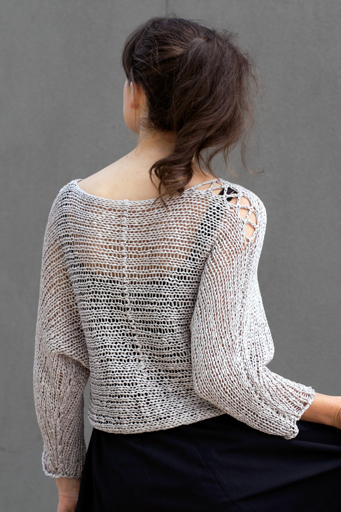 CBack view  of Large Stitch Batwing jumper, knitted  in Pearl cotton and designed by Wendy Voon