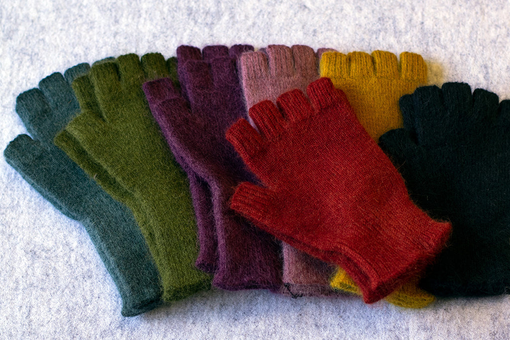 Group of colourful fingerless gloves made from angora and lambswool