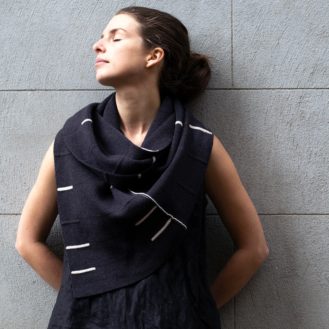 Knitted charcoal infinity scarf with cream stripes