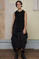 Model wears black knitted asymmetric vest, designed and knitted in Melbourne by Wendy Voon knits