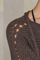 Close up fabric view of loose cord knit batwing in mushroom, designed by Wendy Voon knits and made in Melbourne.