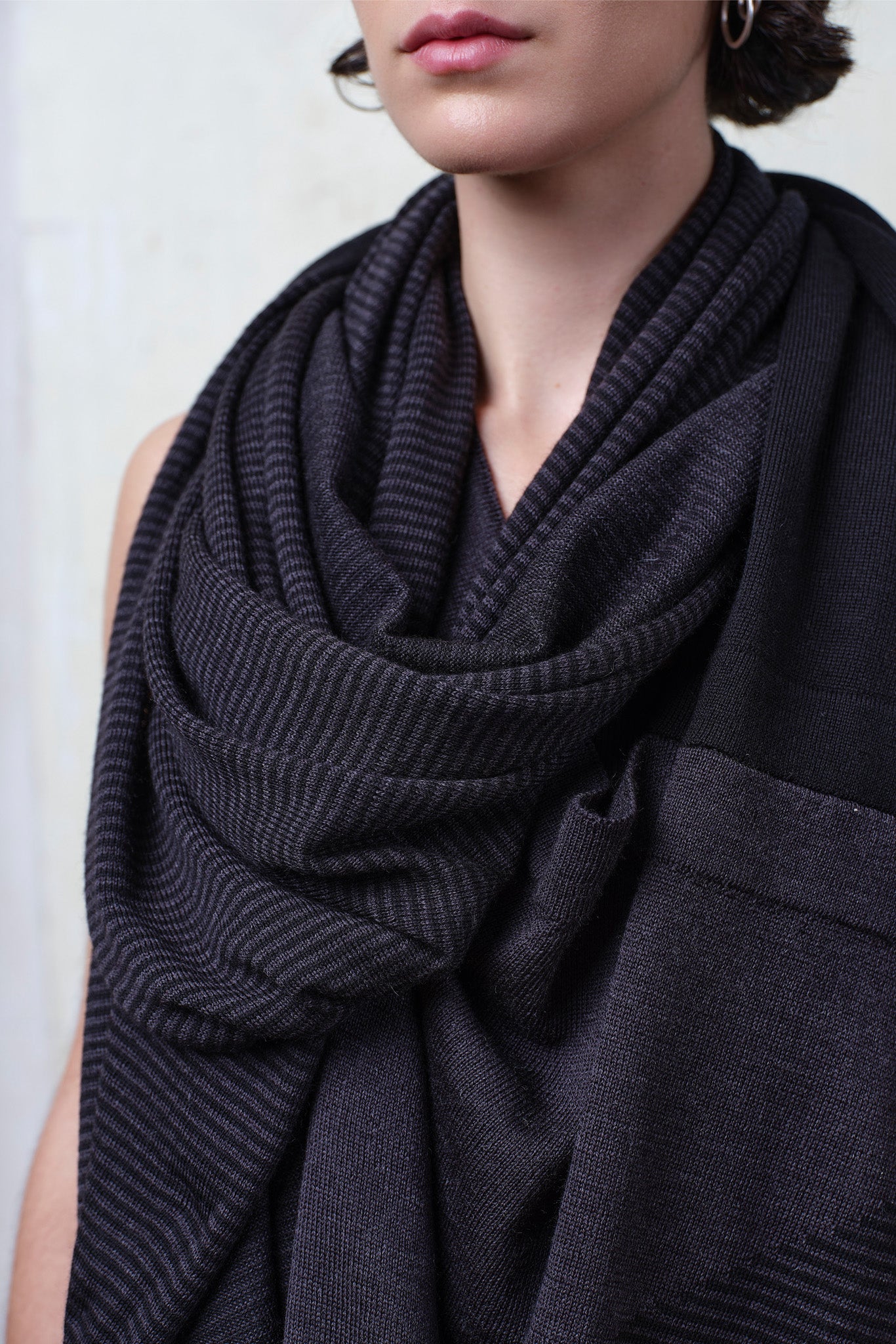 Close up of striped wrap fabric in charcoal/black colourway