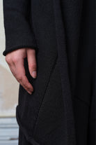 Close up fabric view of merino cross over in black