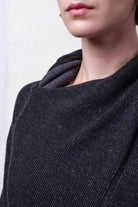 Close up fabric view of merino crossover in charcoal and black colourway