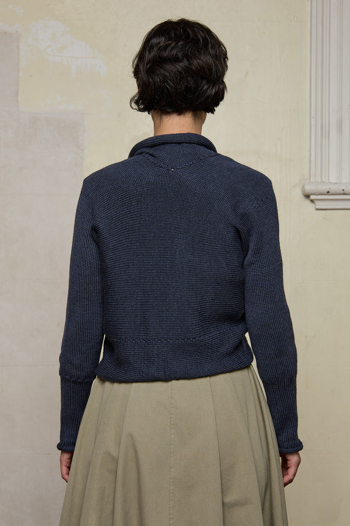 Back view of Chunky Knit Cardigan design by Wendy Voon in charcoal blue superfine merino wool.