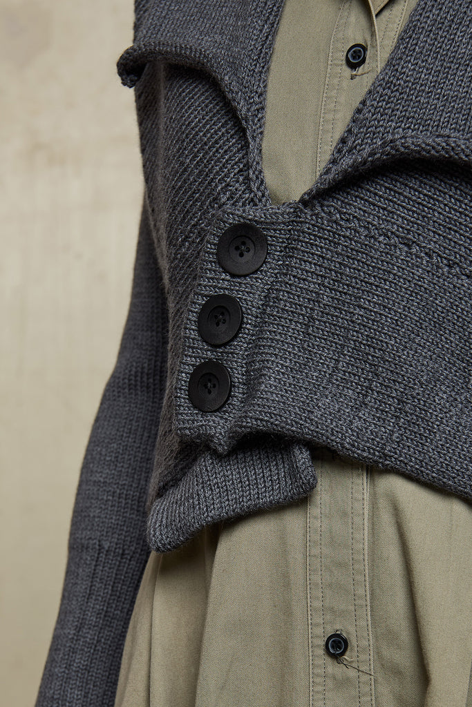 Close up fabric view  of Chunky Knit Cardigan design by Wendy Voon in steel grey superfine merino wool with black buttons.