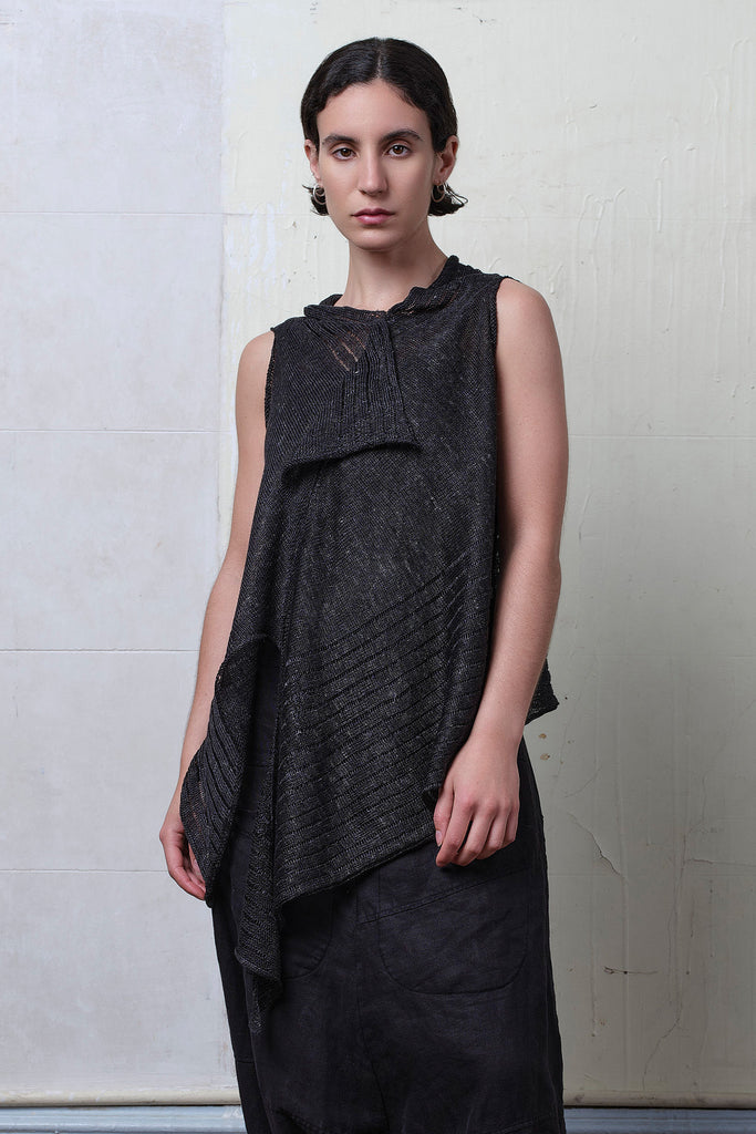 Model wears charcoal linen laddered vest. Designed and knitted in Melbourne by Wendy Voon knits.