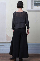 Back view of Cotton Batwing  in slate colourway, featuring large stitch details,  designed by Wendy Voon knits.