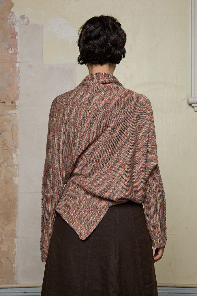 Back view of a alpaca/wool/cotton variegated  bias cut jumper in an autumn melange colourway, a designed by Wendy Voon and made in Melbourne.