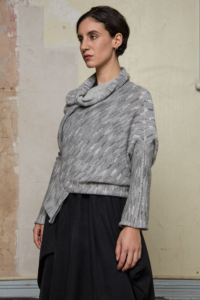 Side profile view of a alpaca/wool/cotton variegated  bias cut jumper in a winter melange colourway, a designed by Wendy Voon and made in Melbourne.