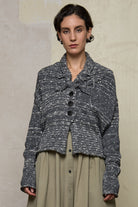 Front view of grey flecked chunky knit cardigan, with ruched detail.  Designed and made by Wendy Voon knits