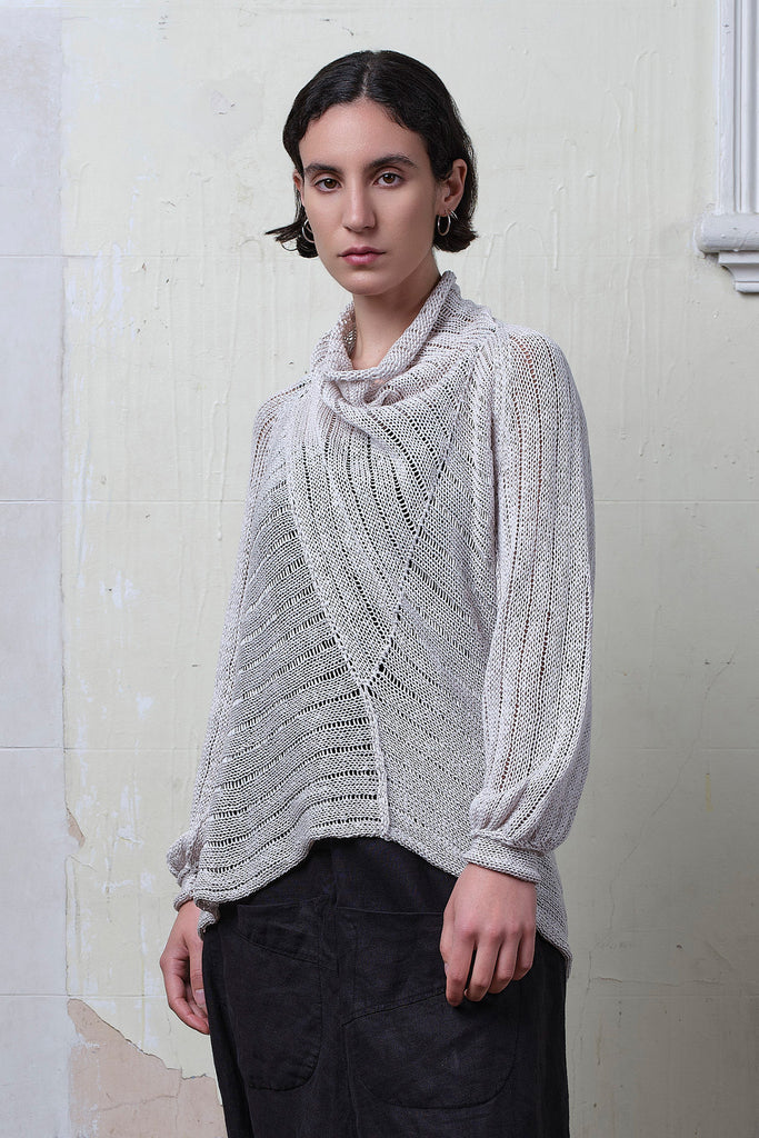 Model wears cotton/linen laddered knitted jumper in pearl, designed and knitted in Melbourne by Wendy Voon knits.