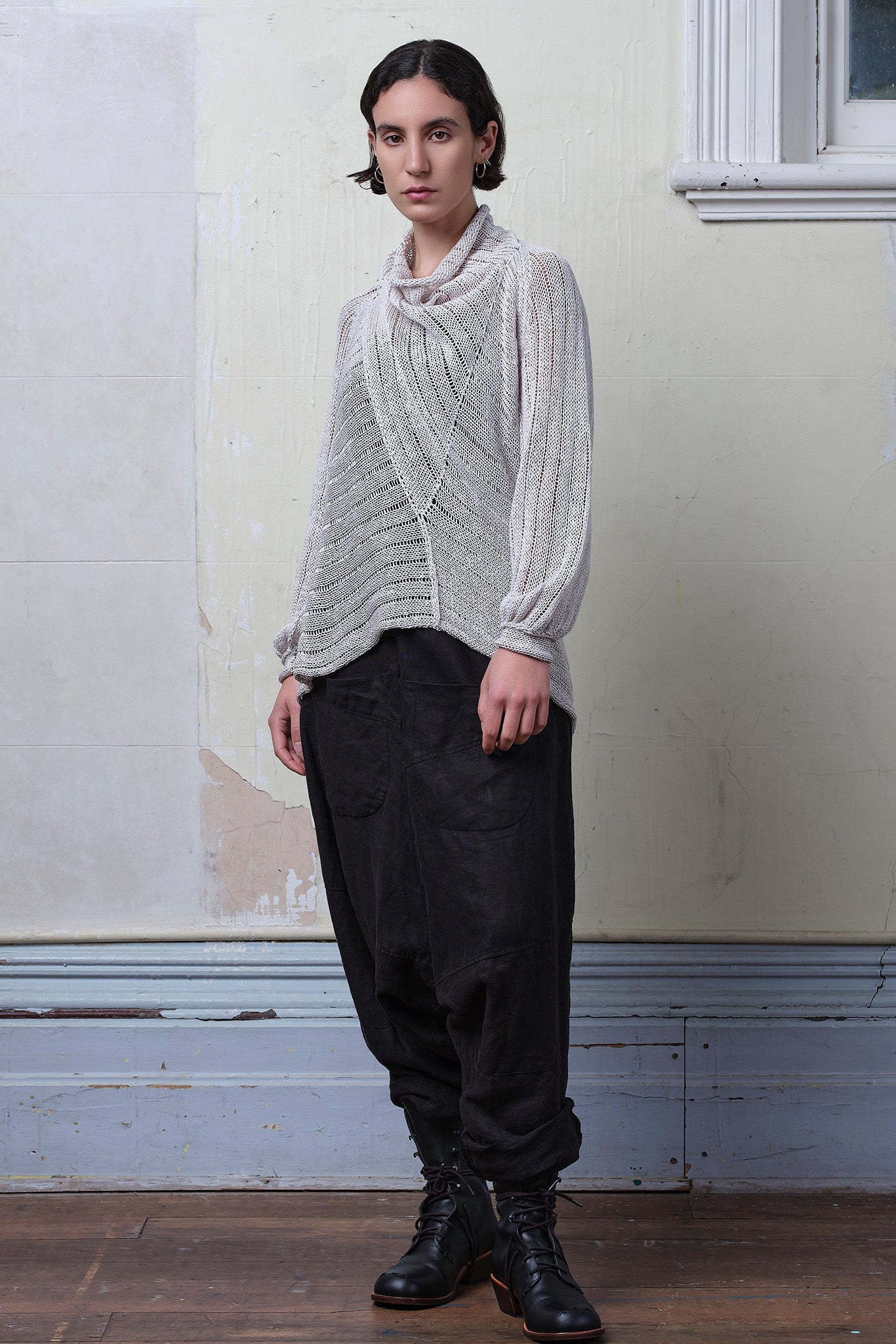 Model wears cotton/linen laddered knitted jumper in pearl, designed and knitted in Melbourne by Wendy Voon knits.