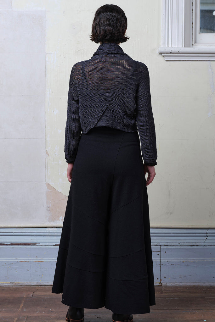 Back view of model wearing cotton cropped jumper  in slate. Designed and knitted in Melbourne by Wendy Voon knits