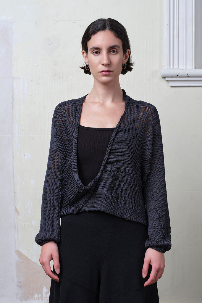 Model wears cotton cropped jumper upside down in slate. Designed and knitted in Melbourne by Wendy Voon knits