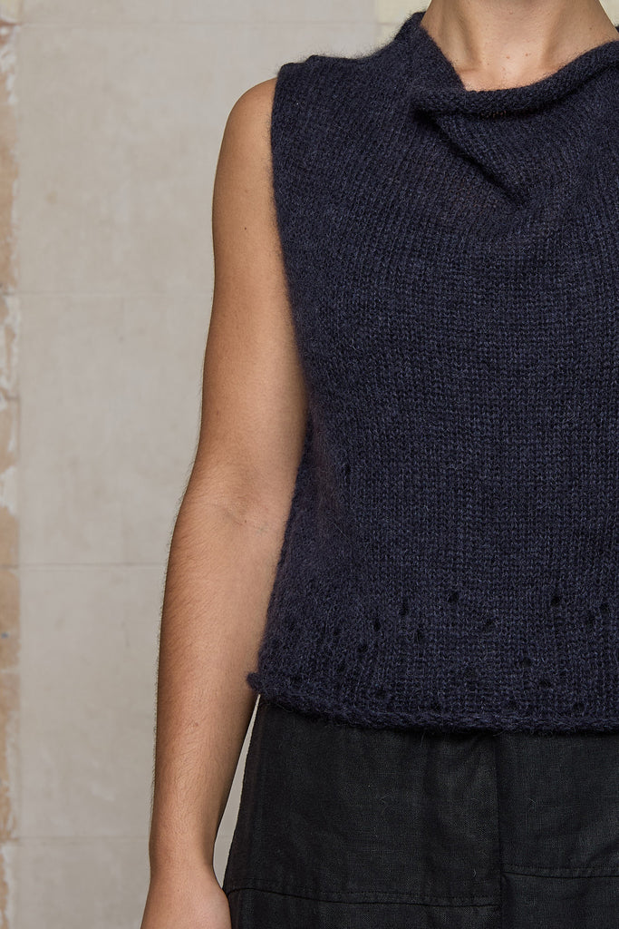 Close up of lacehole detail on  super lush knitted vest in midnight colourway, designed and knitted in Melbourne by Wendy Voon knits 