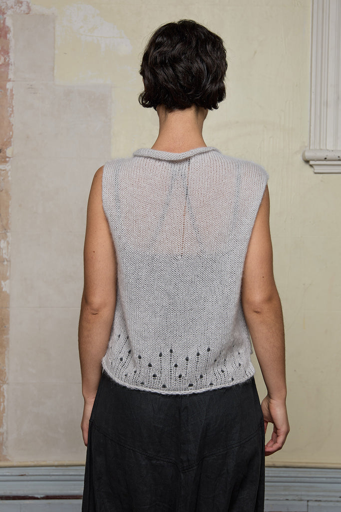 Back view of model wearing super lush knitted vest in soft grey colourway, designed and knitted in Melbourne by Wendy Voon knits 