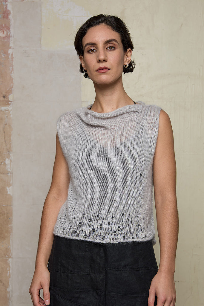 Front view of model wearing super lush knitted vest in soft grey colourway, designed and knitted in Melbourne by Wendy Voon knits 