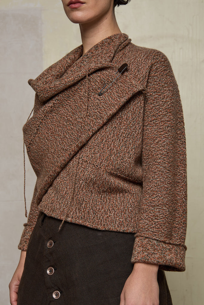 Close up view of knitted wool cropped jacket in rust, army and cream melange, designed by Wendy Voon, knitted in Melbourne.
